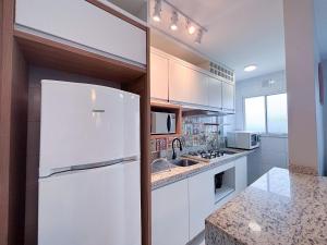 Apê com AC, Garagem e Piscina em Canasvieiras