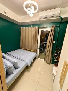 Kathys Crib 11th flr 2 at Shell Residence pool view