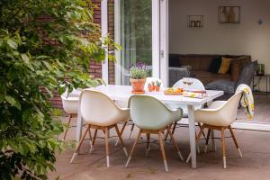 Grove Den I Heerlijk vakantiehuis met bosrijke tuin