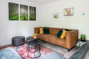 Grove Den I Heerlijk vakantiehuis met bosrijke tuin