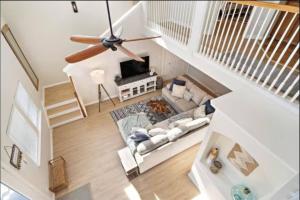 Beach house with large deck and patio