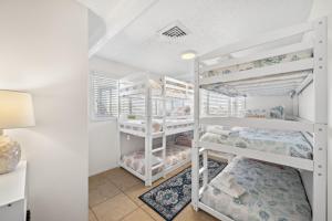 Beach bungalow with stunning ocean views and huge deck just steps away from the beach