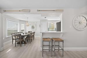 Oceanfront home with pool, large decks, fire pit and private walkover to the beach