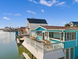 Canal front home with boat slip, deck and gorgeous water views