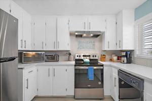 Canal front home with boat slip, deck and gorgeous water views