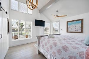 Canal Front Home with Boat Slip, Game Room, and Great Water Views