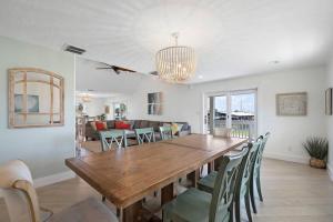 Canal Front Home with Boat Slip, Game Room, and Great Water Views