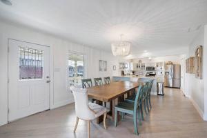 Canal Front Home with Boat Slip, Game Room, and Great Water Views