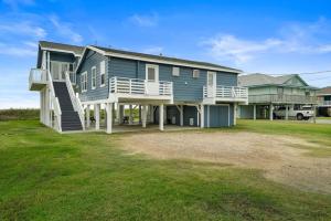 Classic beachfront home with panoramic ocean views and multiple decks