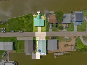 Waterfront beach house with the ultimate game room and two docks