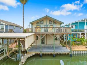 Waterfront beach house with the ultimate game room and two docks