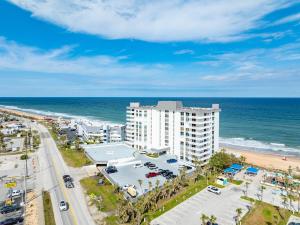 New listing! Direct oceanfront condo with private balcony overlooking the pool and beach
