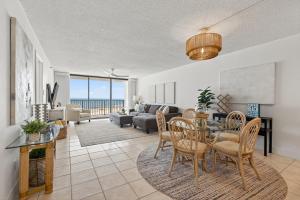 New Listing! Updated direct oceanfront condo with a pool, hot tub, and garage parking