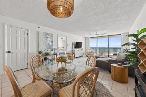 New Listing! Updated direct oceanfront condo with a pool, hot tub, and garage parking