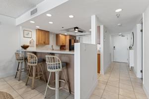 New Listing! Updated direct oceanfront condo with a pool, hot tub, and garage parking