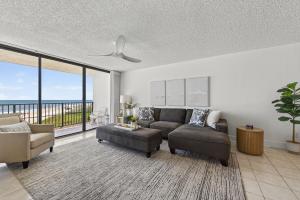 New Listing! Updated direct oceanfront condo with a pool, hot tub, and garage parking