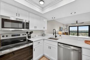 New Listing! Fully renovated with a sunset view, beachfront property with a heated pool