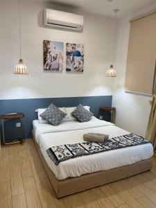 ITCC Manhattan Suites by Cozyqa Stay