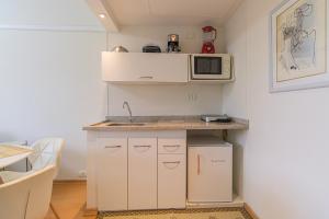 Flat c Academia, Sauna e Garagem - Jardim Paulista