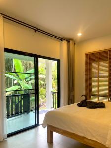 The Whispering Palm Coconut Lane