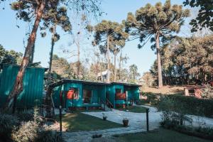 Chalé Climatizado, com banheira e varanda em frente ao Parque do Passaúna em Curitiba by Tiny House Passaúna