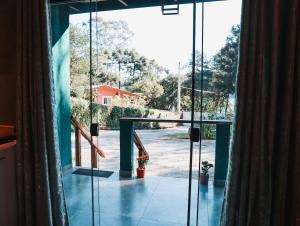 Chalé Climatizado, com banheira e varanda em frente ao Parque do Passaúna em Curitiba by Tiny House Passaúna