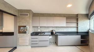 Studio Amplo e Aconchegante com Churrasqueira