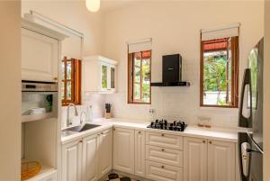 La Dona by The Blue Kite - 4BHK Private Pool Villa in Assagao with Garden, Balcony, Caretaker & Spacious Living Area