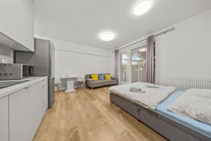 Air conditioned 1 room Apartment, with garden, new building