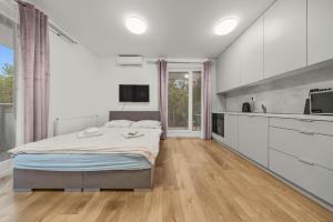 Air conditioned 1 room Apartment, with garden, new building