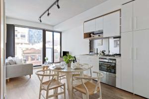 Cozy 2BR Retreat Steps from Melbourne Central