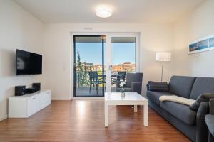 Hafenblick - Wohnung in der Hafenresidenz mit Balkon & Wasserblick