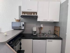 Appartement 32m² avec balcon, proche télécabines - FR-1-812-100