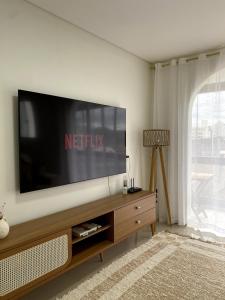 Apto charmoso com equipamento de ginástica