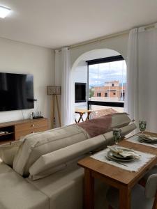 Apto charmoso com equipamento de ginástica