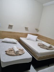 Pousada Quarto Standard com ar ,tv Wi-Fi Garagem gratuita