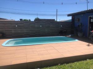 Hospedagem familiar com piscina e churrasqueira
