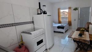 Kitinet completa com varanda Praia de Caiobá