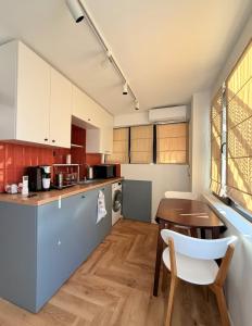 Modern 1BR with Orange Accents