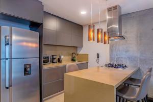 R211 Loft with large balcony, infinity pool and spa