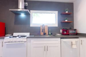 Modern Private Guesthouse with Parking, Yard, and Washer Dryer