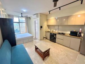 Lakefront AC Balcony LakeView Studio Apartment at Hiranandani Estate, Thane