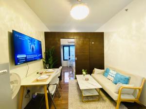 Tropical Chic Escape With City lights View- Modern Scandi