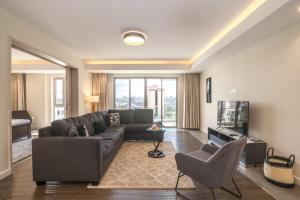 Capital M Pearl Line 1 bed by YourHost Nairobi
