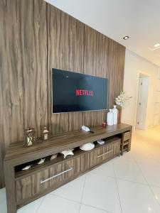 Apartamento 4 suítes perto do mar