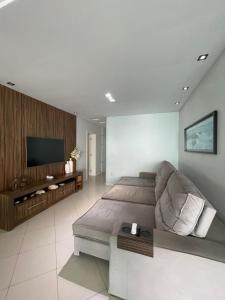 Apartamento 4 suítes perto do mar