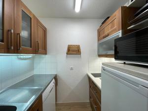 Appart 4 pers, accès direct pistes, terrasse, 50m remontées - FR-1-356-426