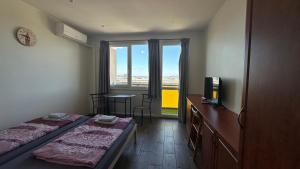 Aranypart Fészek Apartman