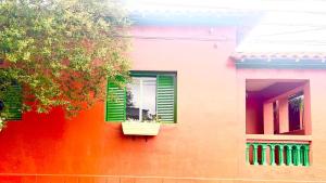 Casa Flores na Janela
