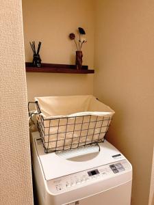 Wa Shinsaka 902 7minute walk from Shinsakacho Station Maximum 4 people Separate bath and toilet Washing machine with dryer